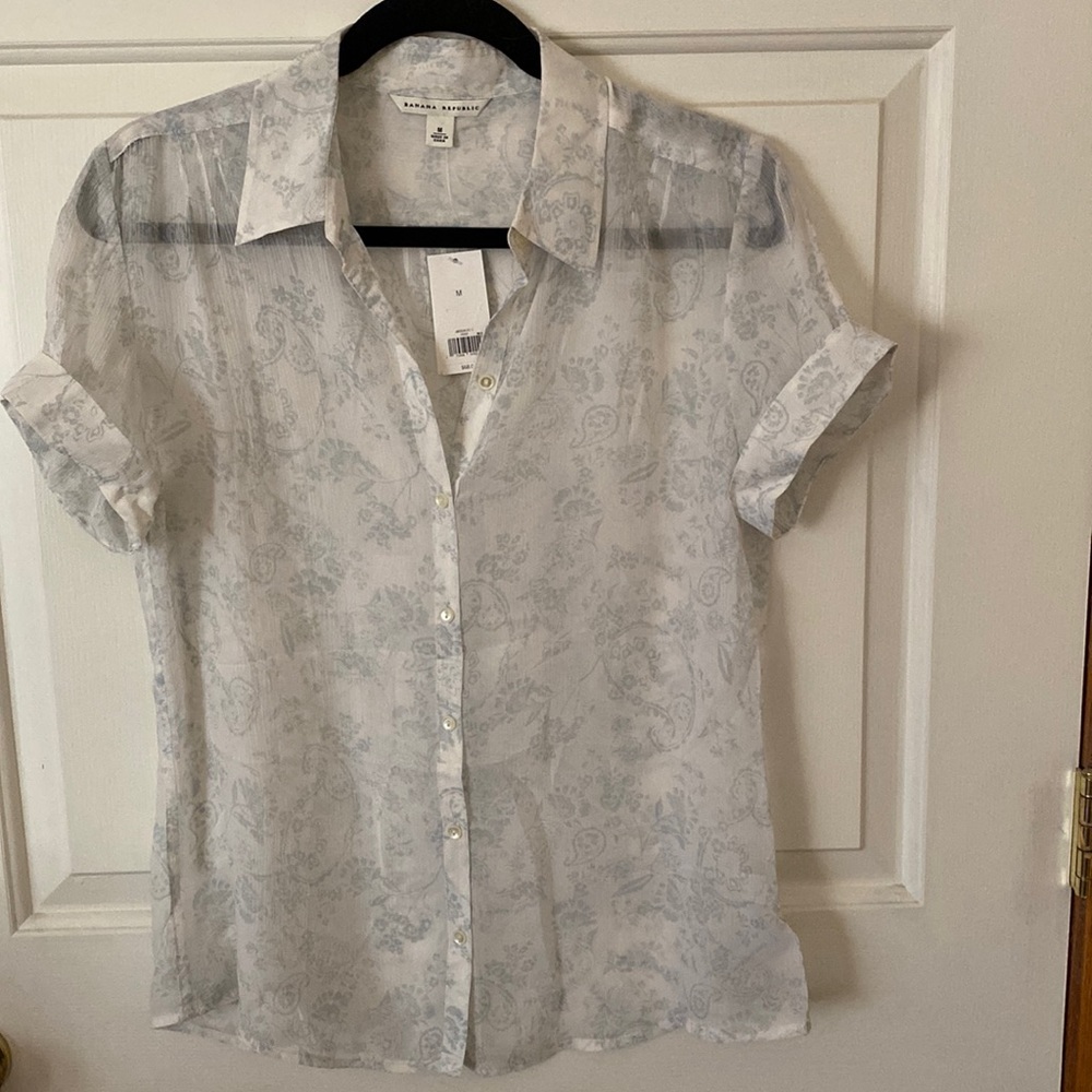 Never worn, sheer, light blue on white paisley blouse.